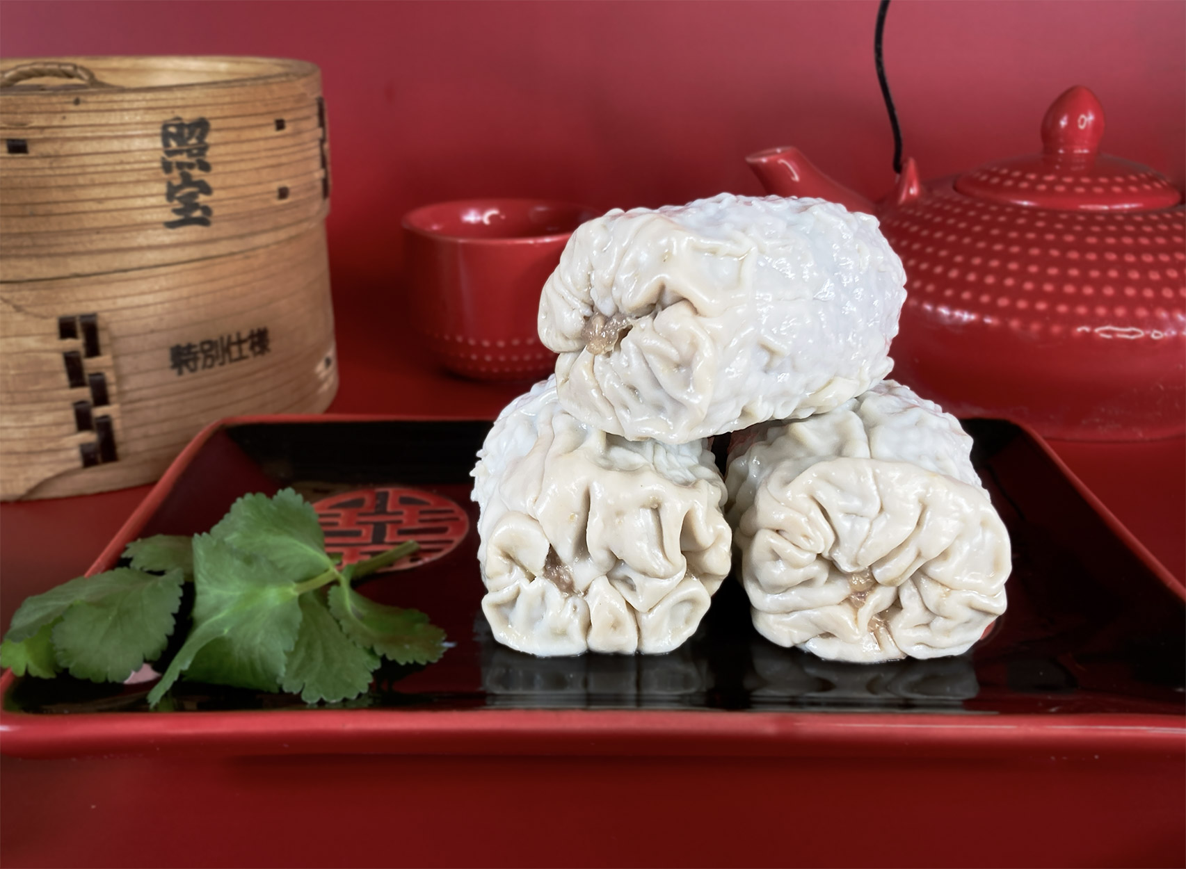 Steamed dim sims with teapot